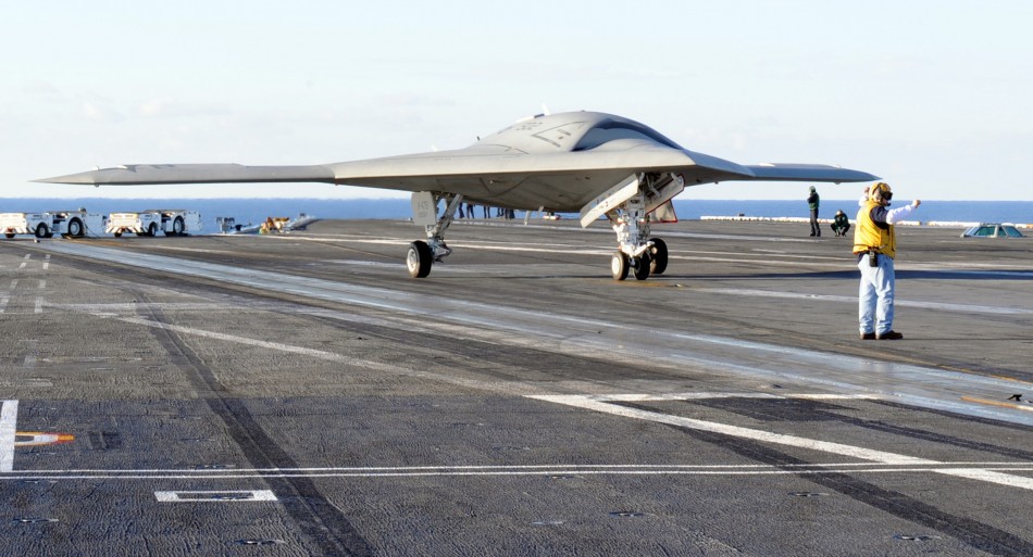 An X-47 B fighter drone aboard the USS Truman ((U.S. Navy/ MC2 David R. Finley Jr)