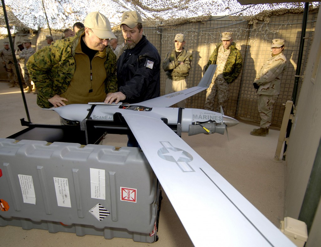 A Boeing contractor working for the Marine Corps explains the ScanEagle to then-Secretary of the Navy Donald C. Winter in 2006. Credit: U.S. Navy photo by Chief Petty Officer Craig P. Strawser