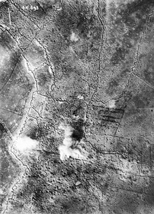 A vertical photograph of Thiepval village, and German front-line and support trenches, while under bombardment by British artillery. Credit: Imperial War Museum